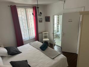 B&B / Chambres d'hotes L'Ex-Voto : photos des chambres
