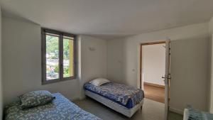 B&B / Chambres d'hotes chambre 2 lits Le Toit Vert Maison Partagee : photos des chambres