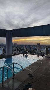 Deluxe One Bedroom Suite by Christine Suites infront of Trinoma Mall