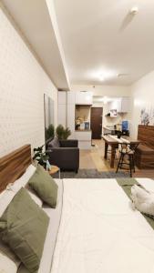 Deluxe One Bedroom Suite by Christine Suites infront of Trinoma Mall