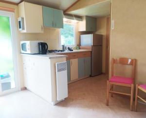 Appartements Spacieux et Cosy Mobil-Home pour 6 a 25min de St Etienne et Annonay au sein d-un charmant Camping : photos des chambres