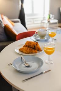 Appartements Embruns - F2 400m de la mer - Juno Beach : photos des chambres