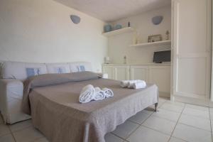 GuestHost - Cozy Open-Plan Apartment in Sardinia