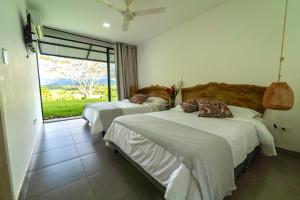 Modern Villa Surrounded by Nature and Gardens with Pool and Stunning Mountain and River Views