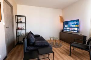 Appartements T2 cosy avec parking : photos des chambres