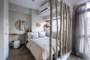 Nature Inspired 1BR in Central BGC Aesthetic Stay