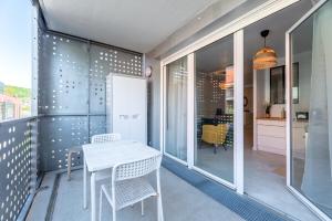 Appartements OIQIA • Bucolie : photos des chambres