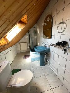 Appartements Charmante petite maison : photos des chambres