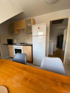 Appartements Charmante petite maison : photos des chambres