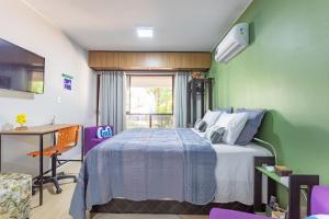 Estúdio aconchegante e funcional - cama casal ou 2 de solteiro - ar condicionado - wifi - netflix - cozinha