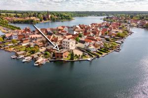 Seaside House - Ferienhaus mit privatem Bootsanleger, Terrasse und Wellness-Komfort direkt am Wasser