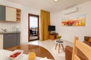 Apartment with Balcony and Sea View room in Apartments Kvarner