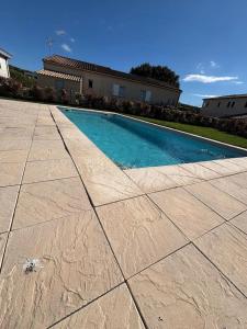 Villas Villa familiale avec piscine a Flaux, 125 m²_2 : photos des chambres