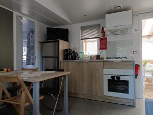 Maisons de vacances Bungalow familial a Saint-Brevin-les-Pins avec piscine partagee_2 : photos des chambres