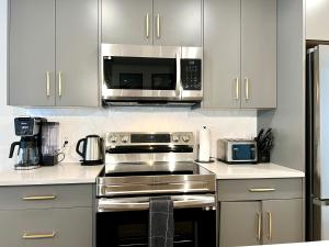 Brand New 2BR Condo with Outdoor Swimming Pool and Hot Tub