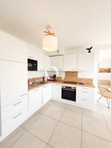 Appartements COC - L'Envolee : photos des chambres