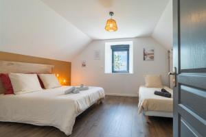 Maisons de vacances Les Combettes - Terrasse, Jardin & Proche Lac : photos des chambres