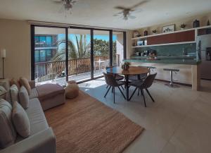 Garden 2BR Apt Steps from the Beach with Pool View