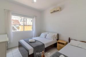 Casa 600m da Praia Central c garagem 3 qts NRR128