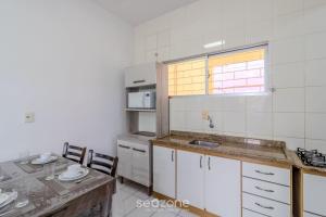 Casa 600m da Praia Central c garagem 3 qts NRR128