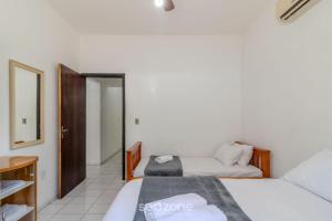 Casa 600m da Praia Central c garagem 3 qts NRR128