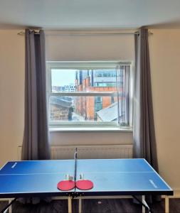 City Centre Apartment With Tennis Table