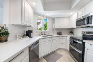 Mid-Century, Two-story with private Balconies & Pool view