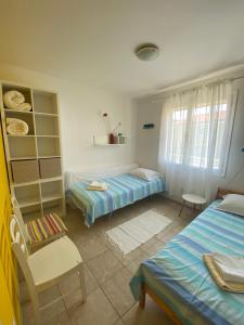 Apartments and rooms with parking space Mali Losinj (Losinj) - 2497