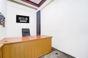 Super Hotel O Pathanamthitta Near Mahatma Gandhi Statue