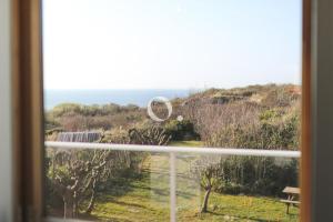 Villas COC - Villa Le Grand Terrain - Vue Mer : photos des chambres