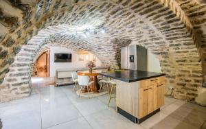 Appartements Le boum coeur douillet troglodyte jardin wifi pk : photos des chambres