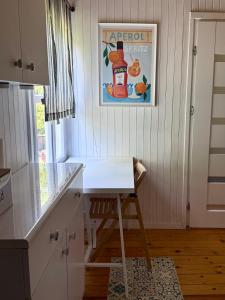 Biały domek nad jeziorem Selment