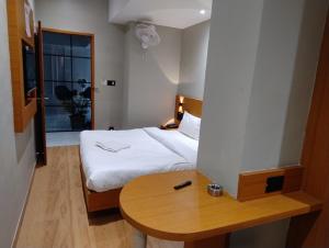 Hashtag Inn opposite Sarusajai Stadium