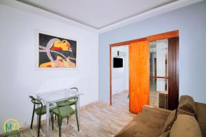 Studio com vista lateral para a praia