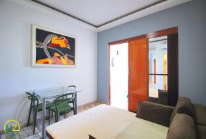 Studio com vista lateral para a praia