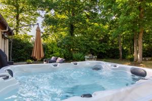 Maisons de vacances La Salamandre - maison avec jacuzzi : photos des chambres