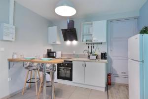 Appartements Les Apparts du Pont Vert - lit double - WiFi - tout inclus - 5 : photos des chambres