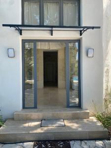 Villas Villa avec piscine et salle de sport : photos des chambres