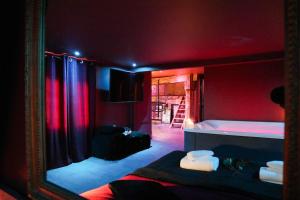 Appartements LE MOULIN DES PLAISIRS atypical SM experience : photos des chambres