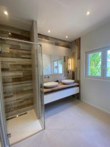 Villas Villa avec piscine et salle de sport : photos des chambres