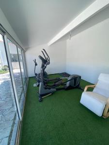 Villas Villa avec piscine et salle de sport : photos des chambres