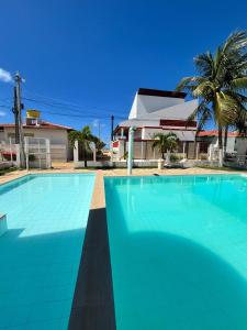 Casa pé na areia em condomínio