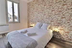 Appartements Les Apparts du Pont Vert - lit double - WiFi - tout inclus - 3 : photos des chambres