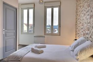 Appartements Les Apparts du Pont Vert - lit double - WiFi - tout inclus - 3 : photos des chambres