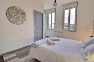 Appartements Les Apparts du Pont Vert - lit double - WiFi - tout inclus - 3 : photos des chambres