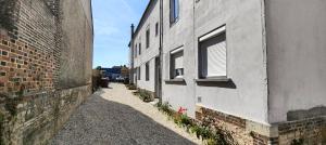 Appartements Les Apparts du Pont Vert - lit double - WiFi - tout inclus - 8 : photos des chambres