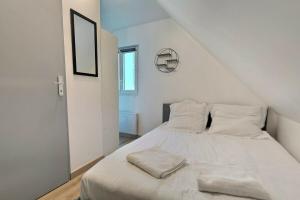 Appartements Les Apparts du Pont Vert - lit double - WiFi - tout inclus - 8 : photos des chambres