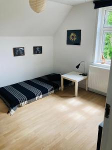 Charmerende byhus - tæt på alt!