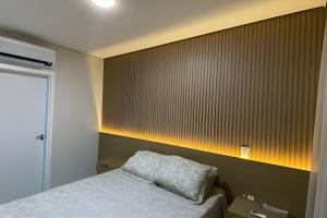 Garden com Churrasqueira em Condomínio com piscina