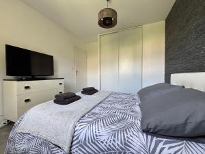 Maisons de vacances Jolie Colombe, maison 3 ch 2 sdb beau jardin terrasse amenagee a 15 mn a pied de la mer et centre Port en Bessin proche Omaha Beach et Bayeux : photos des chambres